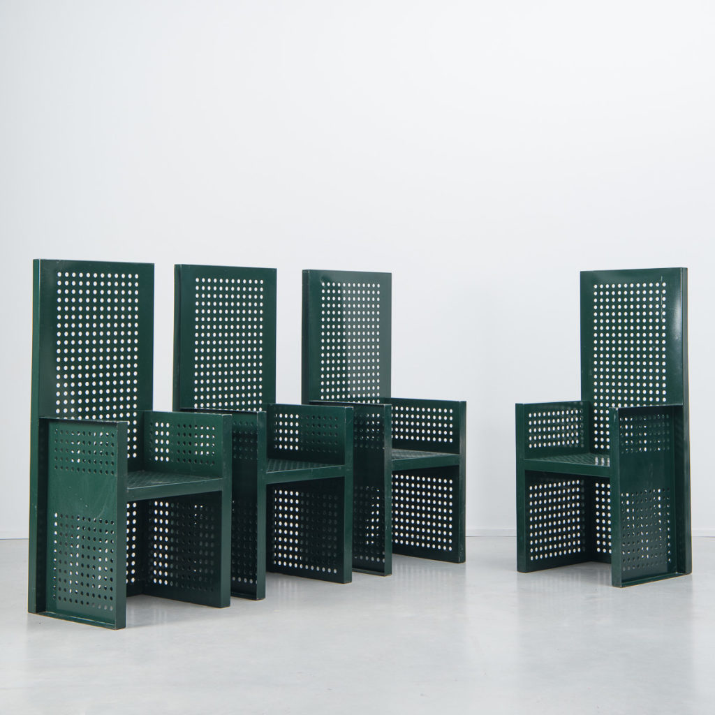 Green perforated metal chairs