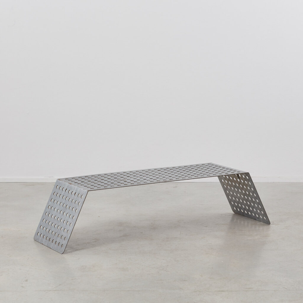 Perforated aluminium metal table