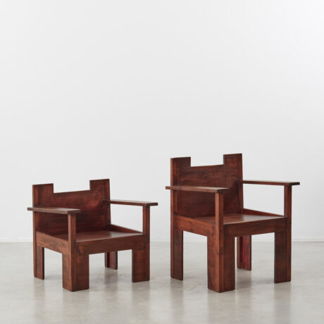 His and hers Brutalist wooden chairs