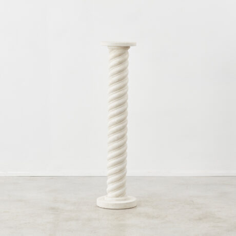 Twisted white plaster column