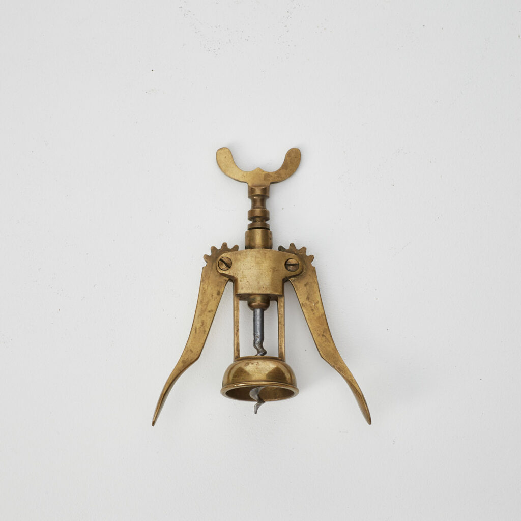 Antique brass corkscrews